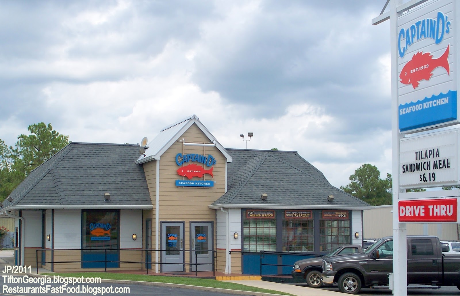 Where can you view a menu and pricing for Captain D's Seafood Kitchen?